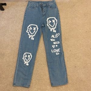 Women’s baggy blue jeans with designs